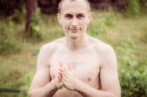 Portrait Of A Naked Man Standing In The Rain Stock Photo Image Of Muscular Muscle