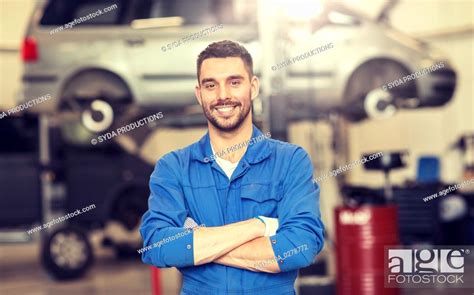 Happy Auto Mechanic Man Or Smith At Car Workshop Stock Photo Picture