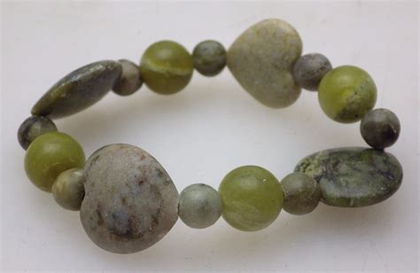 3 Polished Semi Precious Stone Bracelets In Various Shades Of Green