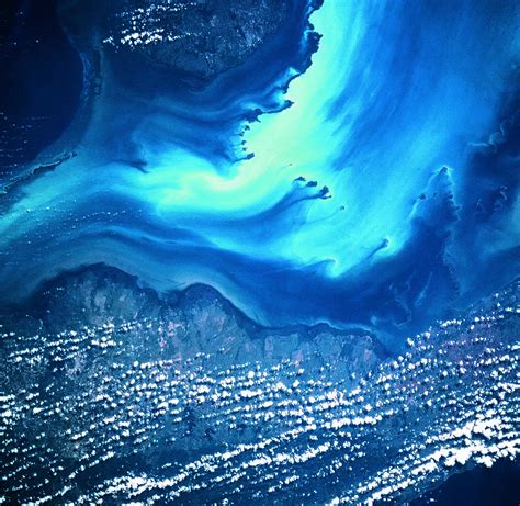 View Of Land And Sea From Space Photograph By Stockbyte Fine Art America