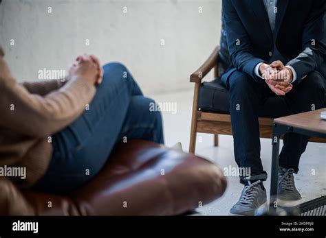 Man And Woman Sitting Opposite Each Other And Talking Stock Photo Alamy