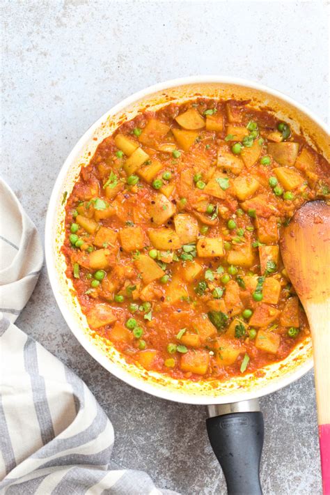 aloo matar indian peas and potatoes in tomato gravy vegan recipe indian potato recipes