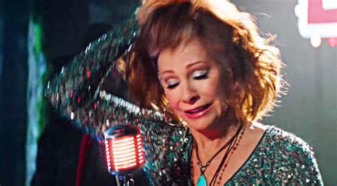 Reba Yanks Off Her Red Hair In A Twist For Kfc