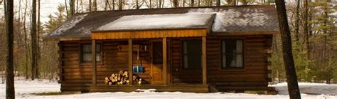 Maybe you would like to learn more about one of these? A modern log cabin is cofered in snow at Black Moshannon ...