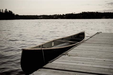 Canoe At Dock Lake Of The Woods Photograph By Keith Levit