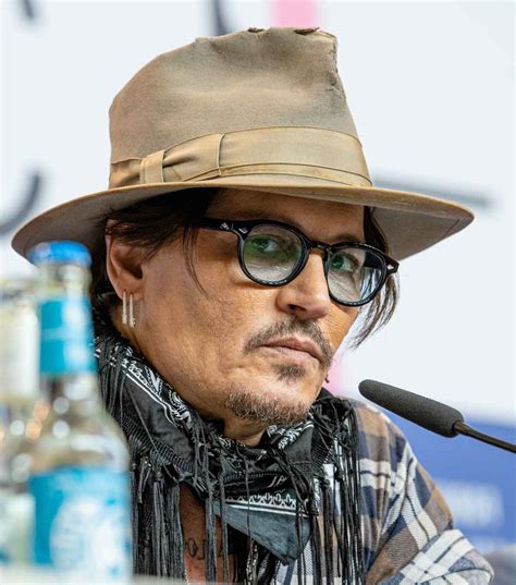(english text below) pressekonferenz während der 70. Johnny Depp en prison et derrière les barreaux, la photo ...
