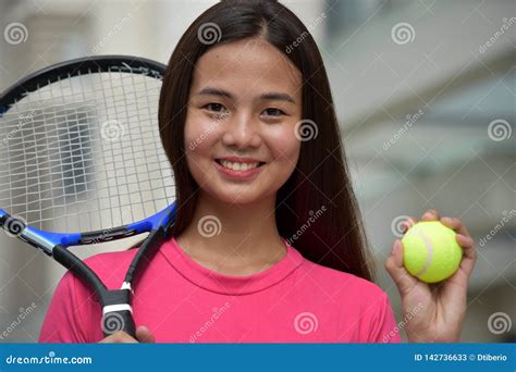 Smiling Diverse Female Tennis Player With Tennis Racket Stock Image