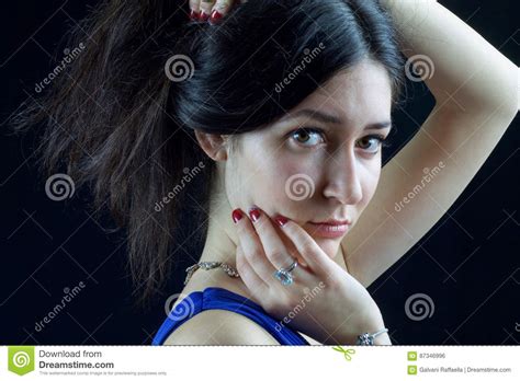 Portrait Of A Beautiful Young Woman With Intense Eyes Stock Photo