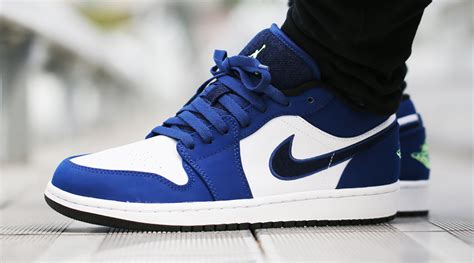 Leaving the hardwood for the tropics, nike jordan exudes an air of cali cool by adding a palm tree pattern across the uppers of this air jordan 1 low. Air Jordan 1 Low Insignia Blue Ghost Green - Sneaker Bar ...