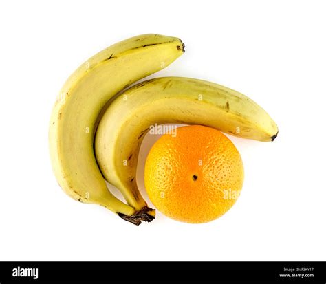 Bananas With An Orange Stock Photo Alamy