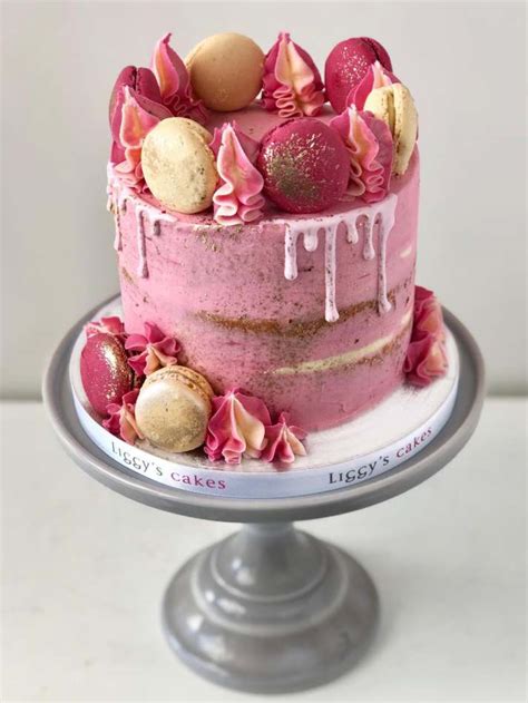 Hot Pink Layer Cake With Swirls And Macarons