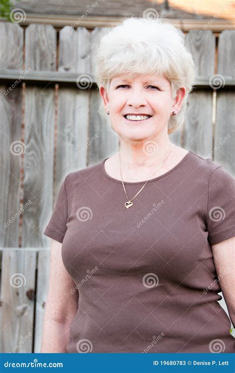 Beautiful Older Woman Stock Image Image Of Fence Attractive 19680783