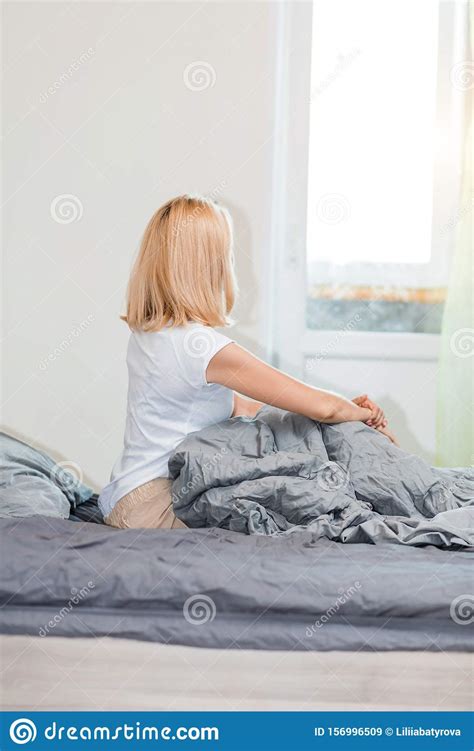 Blonde Woman Sitting In Bed At Home Stock Image Image Of Happy Blanket 156996509