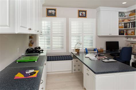 Integrate a craft area into a room that already has a purpose. Custom Craft Room Organization and Built-ins | Closet Factory