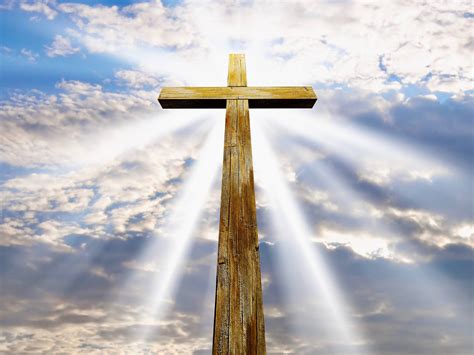 Download Christian Cross Illuminated By Sun Wallpaper