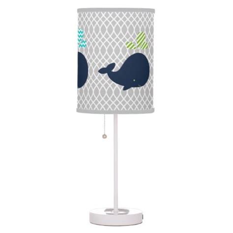 The lamp is paired with a modern gray round drum shade to complete the look that you need. Navy Blue Whales on Gray Table Lamp | Zazzle.com | Grey ...