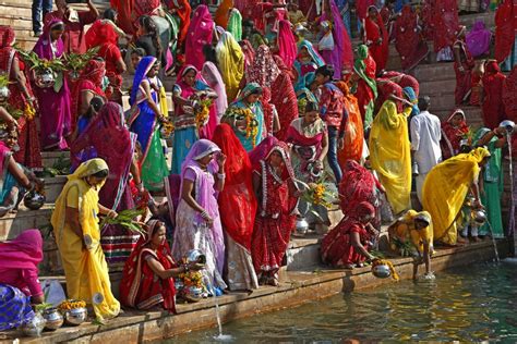 Hindu Women Collect Water From The Pushkar Lake To Pour On Idols Of Lord Shiva On Occasion Of