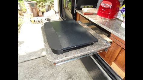 They also work well for preparing sides while grilling out. Replacing drawer glides outdoor RV kitchen - YouTube
