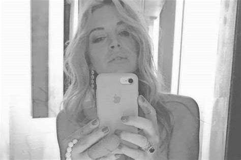 Lindsay Lohan Sizzles In Topless Snap After Flirting Up A Storm With