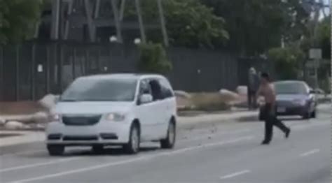 Witnesses Restrain Man Throwing Rocks Through Vehicle Windows WSVN