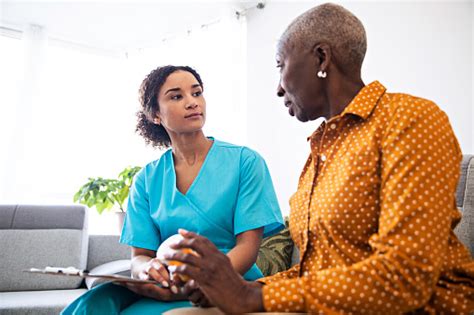 Online doctor & medical services. Medical Consultation At Home Stock Photo - Download Image ...