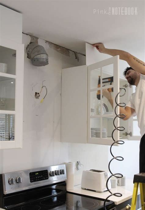 Using a triagular backing piece with ca glue and nails.background music: DIY: How to Disguise a Kitchen Soffit | Kitchen soffit, Bulkhead kitchen, Above kitchen cabinets