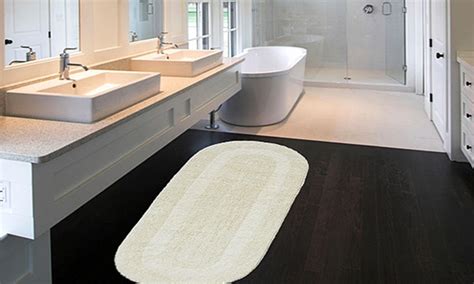 After you're fresh and clean, there's no better feeling than stepping out onto a soft, plush bath mat. Extra-Large 24"x60" Double Vanity Reversible Cotton Bath ...