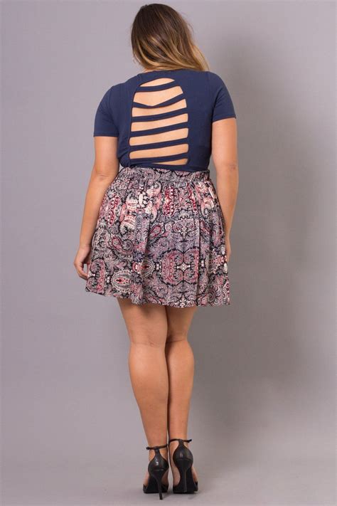 This Plus Size Woven Mini Skirt Features All Over Pleating Elasticized Waistband And Al
