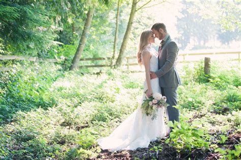 An Angelic Sunlit Field Fun Props And A Striking Couple All