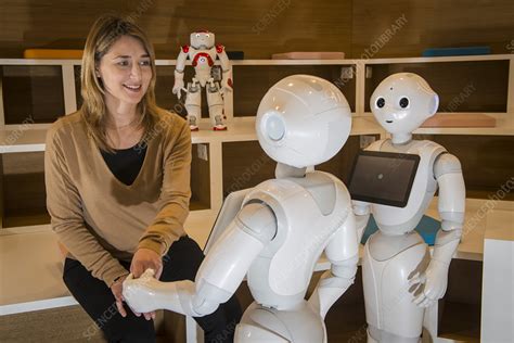 Researcher With Pepper And Nao Robots Stock Image C0481820