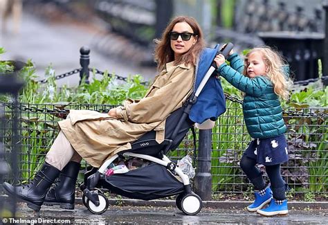 irina shayk looks chic as daughter lea tries to push her model mom around in a stroller daily
