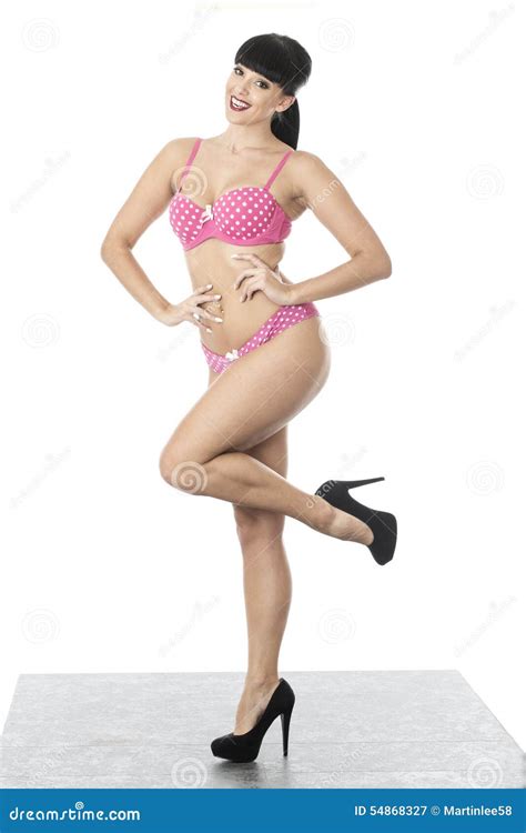 Gorgeous Cute Glamorous Pin Up Model Posing In Pink Polka Dot Lingerie