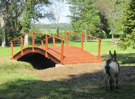 High Arched Tractor Bridge To Go Over A Creek Handcrafted Garden