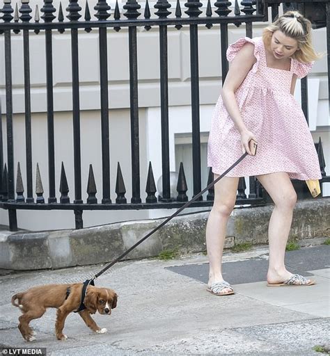 Georgia Toffolo Displays Her Slender Pins In A Pink Frilled Sundress As