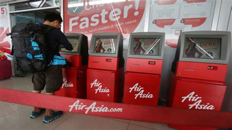 Airasia | steps for self bag tag: AirAsia goes 100% self-service at Kuala Lumpur - PASSENGER ...
