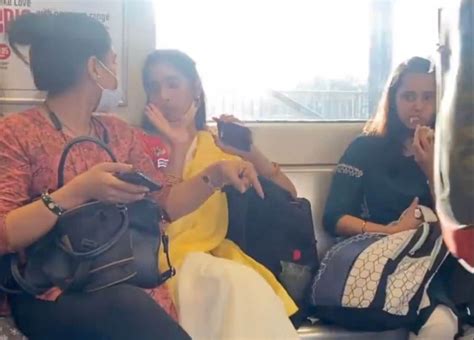 Viral Video Women Fight In Delhi Metro Over Seat Sharing Netizens