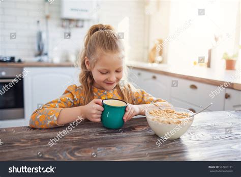 Cute Little Girl Eating Cereal Milk Stock Photo 567786121 Shutterstock