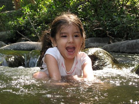 Alice Having Fun In The River