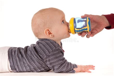 Baby Drinking From Beaker Stock Images Image 22963984