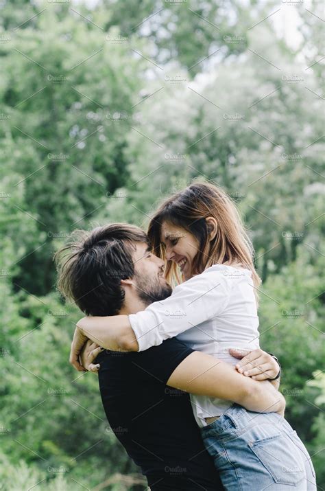 Happy Couple Kissing And Hugging In High Quality People Images ~ Creative Market