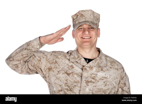Saluting And Smiling Army Soldier Studio Shoot Stock Photo Alamy
