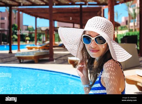 Woman Sunbathing On Pool Hi Res Stock Photography And Images Alamy