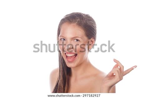 Portrait Of A Teen Girl With Nude Makeup And Clean Skin She Laughs And