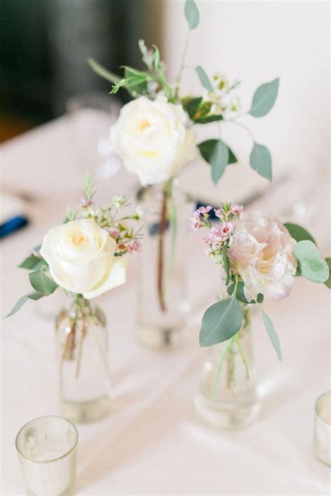 Simple Floral Centerpieces Jars With Cream Roses Wildflowers