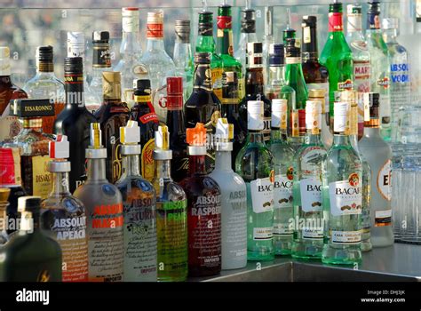 Lots Of Bottles Of Alcoholic Spirits And Liqueurs On A Bar Stock Photo