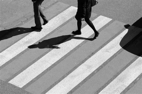 Top View Of Couple Man And Women People Walk Across Crosswalk In The