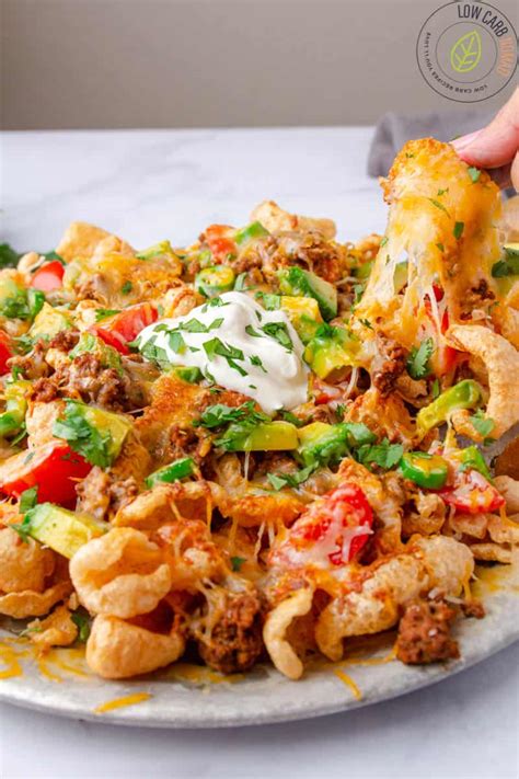 Pork rinds must be seasoned immediately after frying so that the spices stick to its surface, making it more flavorful. Easy Keto Nachos with Pork Rinds • Low Carb Nomad