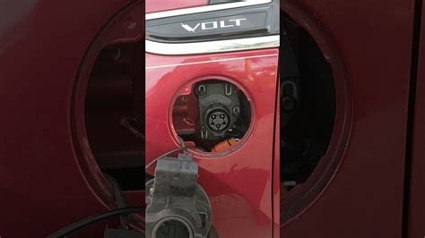 How to adjust charge port Chevy Volt. 