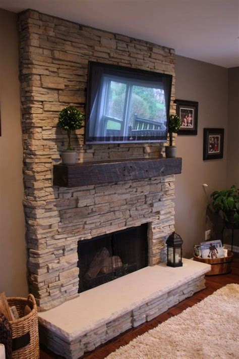Stunning White Stacked Stone Fireplace Idea With Fireplace Door And