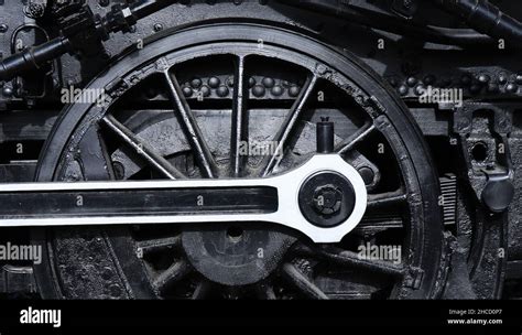 Grayscale Shot Of An Old Steam Locomotive Wheel Stock Photo Alamy